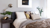 Kubus Gold Custom Designer Pillow on bed | Arianna Belle 