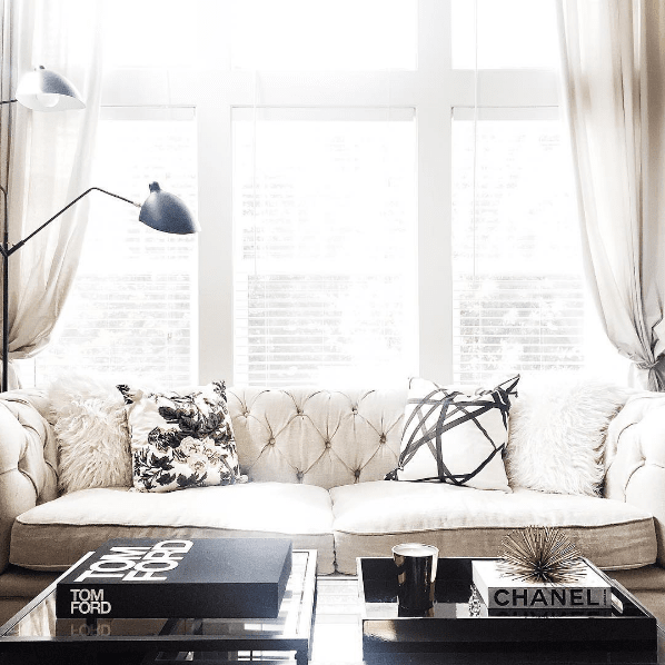 Channels Ebony & Ivory with Pyne Hollyhock Charcoal Custom Designer Pillow on sofa | Arianna Belle 