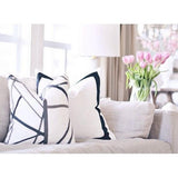 Channels Ebony & Ivory with Solid White with Grosgrain Ribbon Border Custom Designer Pillow on sofa | Arianna Belle 