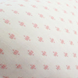 closeup detail of Barlow Blush throw pillow from Arianna Belle - blush pink small embroidered pattern