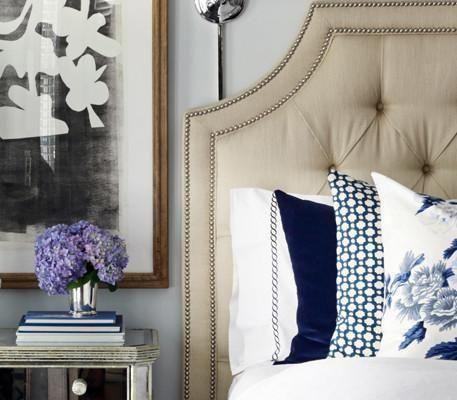Betwixt Indigo Blue Custom Designer Pillow on bed with Pyne Hollyhock Indigo Designer Pillow | Arianna Belle